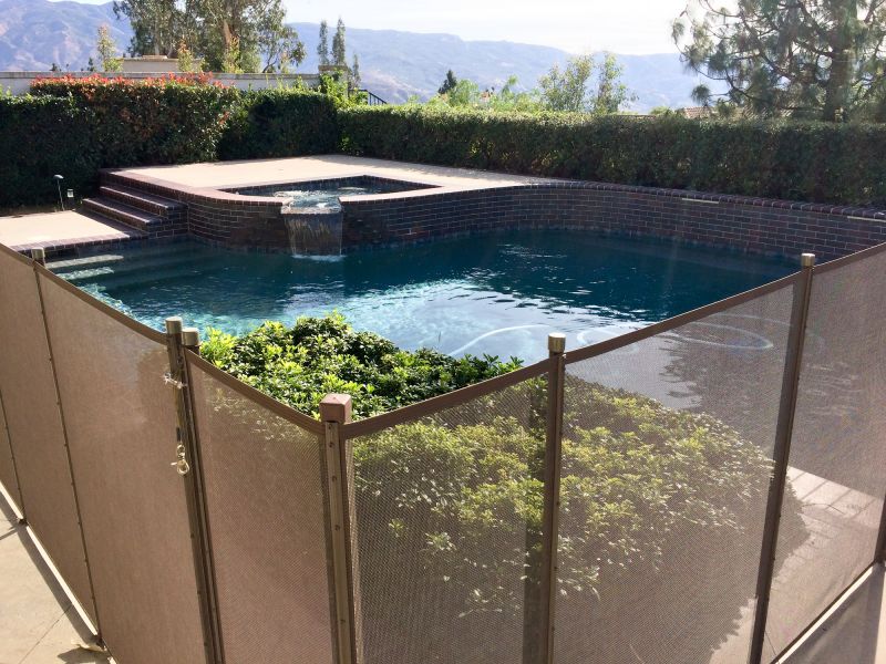 Mesh Fence with Pool Background